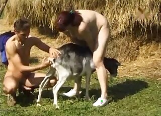 Chubby redhead holds goat while husband gives pussy fingering