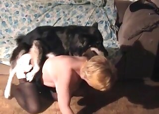 Aged wife has hardcore fun with her dog in a hot animal porn action