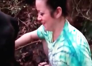 Ugly slut wanks to a stallion and sucks its huge dick like insane
