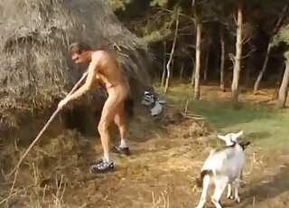 Blonde with a sexy face enjoys a zoophilic threesome with a goat